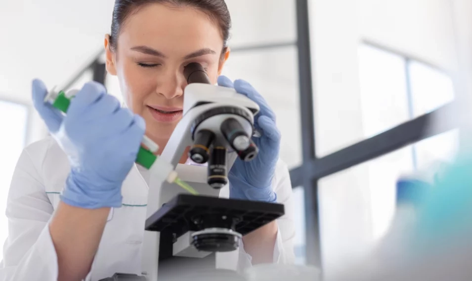 scientist-working-with-microscope